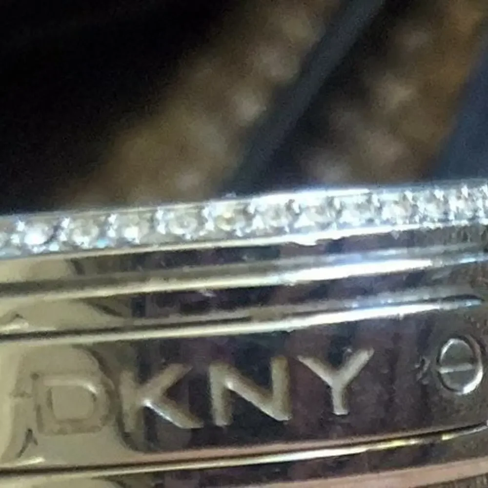 DKNY womens silver watch large dial rhinestone bezel